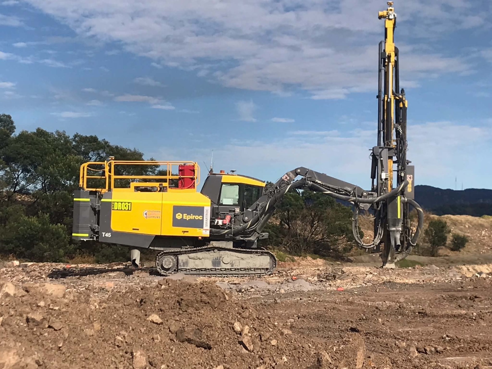 Two Epiroc rigs drilling side by side