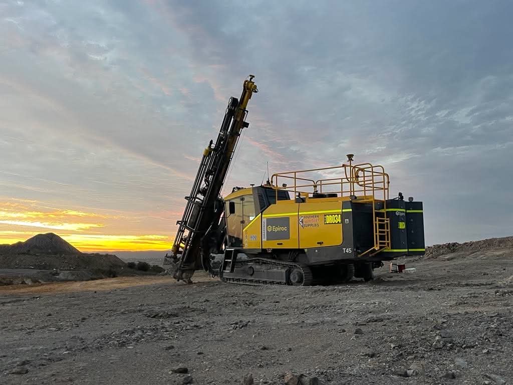 Yellow Epiroc drill rig working on a mine site